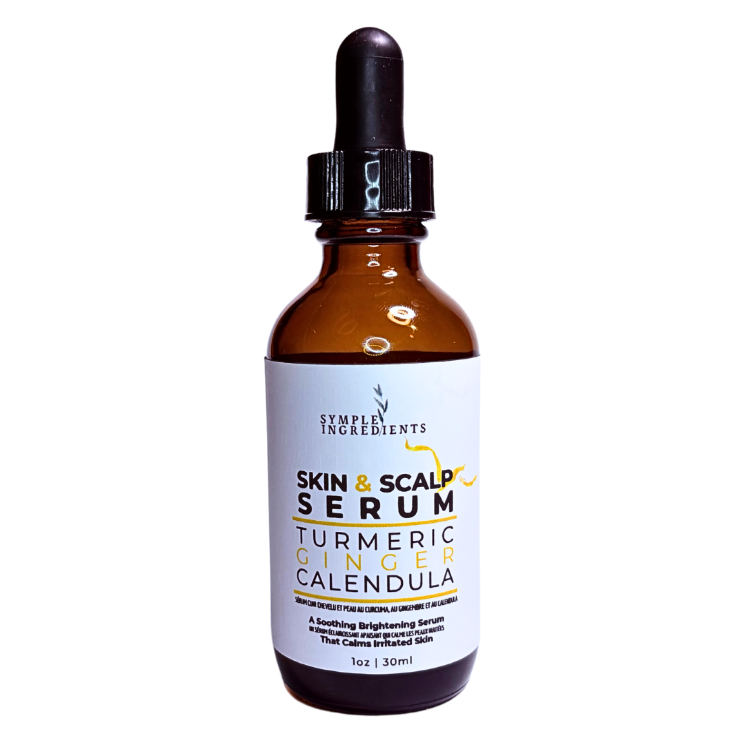 Turmeric ginger calendula all natural skin and scalp serum in an amber  glass bottle with dropper for portion control.